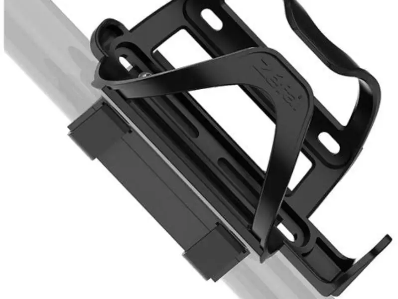 stationary bike bottle cage mount holding bottle and phone