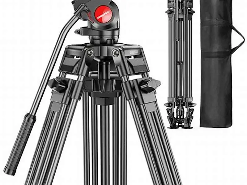 tripod set low near gym bar filming weightlifter